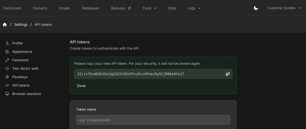 One-time API token reveal with copy field and Done